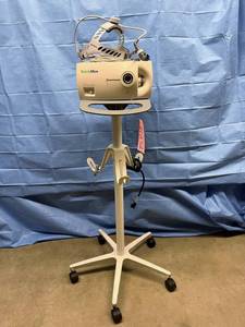 lot 32 image: WOW MSRP $3200 Welch Allyn CL 300 Surgical Illuminator Headlight W Light Source Headgear & Mobile Stand For Doctors, Veterinarians & More - Excellent Working Condition
