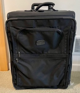 lot 79 image: Tumi Rolling Travel Bag Suitcase