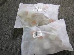 2 packages of 32 chair foot covers ...