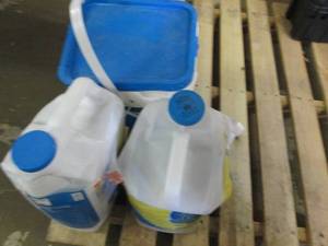 3 damaged tubs of cat litter...
