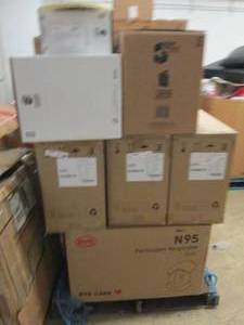 pallet of sharps containers and par...