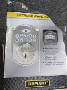 defiant keypad deadbolt open box...