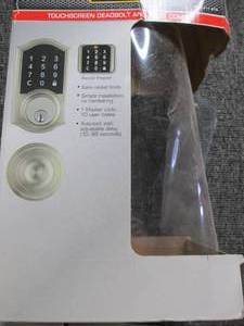 defiant touchscreen deadbolt and kn...