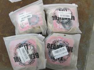 4 packages of new messy hair buns...