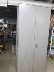metal 2 door cabinet 85 inches tall...