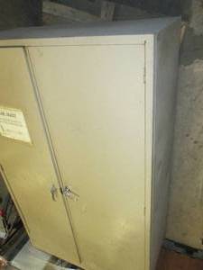 2 door metal cabinet 78 inches tall...