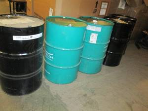 5 55 gallon metal drums . had oil ...