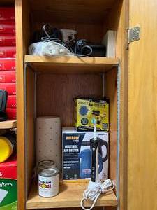lot 134 image: Contents of Cabinet  Games, Tools, Cleaning, & Much More