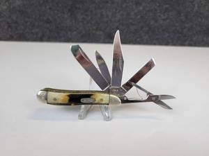lot 866 image: W.R. Case & Sons Cutlery Co. - 6th Edition Peanut Big Nut 5 Blade Pocket Knife with Scissors, Genuine Midnight Stag Bone Handle, M5520 SS, Engraved with 032