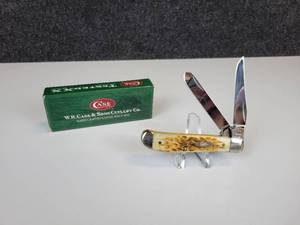 lot 864 image: W.R. Case & Sons Cutlery Co. - Mini Trapper 2 Blade Pocket Knife, Jigged Amber Bone Handle, 6207 SS, Item No. 00013
