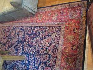lot 29 image: Large 10ft12ft dark tone area rug.