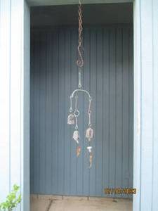 lot 77 image: Heavy duty petina metal windchime.