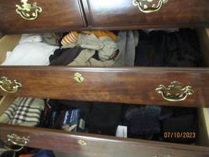 lot 82 image: mens winter hats, gloves. ear muffs, t-shirts dress socks, boot socks and sport socks