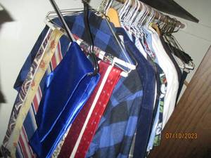 lot 85 image: mens clothing size medium and large tops and 30x30-32x30 bottoms