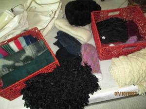 lot 99 image: Baskets loaded with an assortment of womens winter hats plus