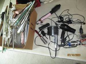 lot 100 image: dress gloves, clothes hanger assortment and more