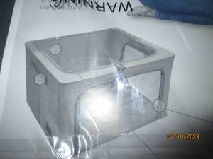 lot 107 image: New in package Periea Organizers