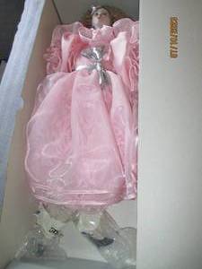 lot 131 image: Belombre Les Poupees porcelain doll...