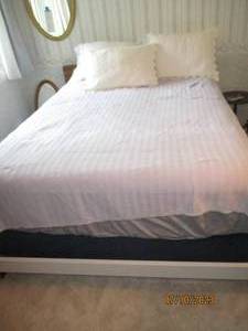 lot 139 image: Full or queen sized bedframe and bedding
