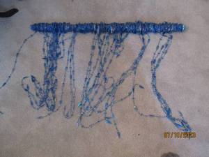 lot 141 image: Blue Mardi Gras style beaded doorway decor
