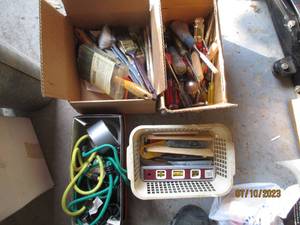 lot 176 image: Paint brushes hand tools and bungee cords