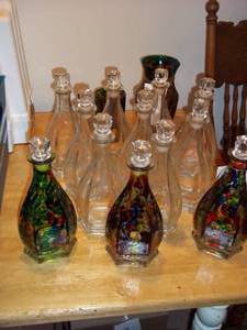 lot 323 image: painted Glass Spirit Pistotniks with lids and vases.
