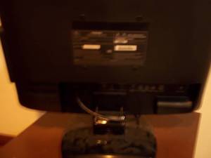 lot 341 image: Toshiba flat-screen TV with remote