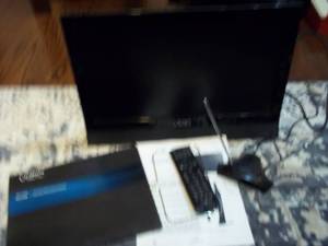 lot 343 image: Vizio TV with remote,