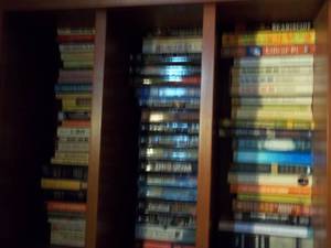 lot 363 image: 3-shelf variety of John Grisham novels