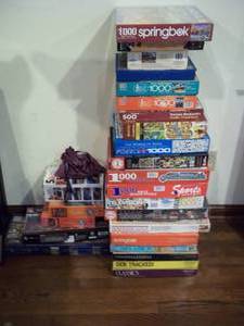 lot 380 image: Huge pile of puzzles.