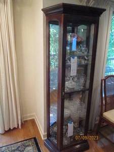 lot 34 image: Cherry Toned Wood and glass display curio cabinet