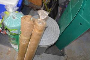 lot 216 image: Metal Trash Can with Gardening Supplies