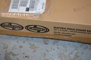 lot 231 image: Electric Pole Chain Saw,