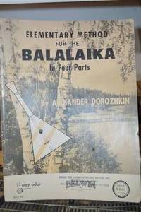 lot 238 image: Small Balalaika w Method Book and parts
