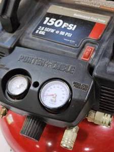 lot 8 image: Porter Cable 150 psi Portable Air Compressor