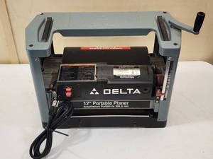 lot 13 image: Delta 12 Portable Woodworking Planer