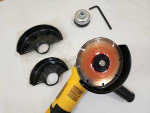 lot 27 image: DeWalt Electric Hand Grinder  Saw