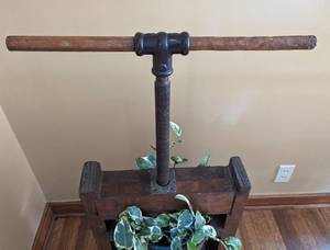 lot 76 image: Antique Grape Press Plant Stand