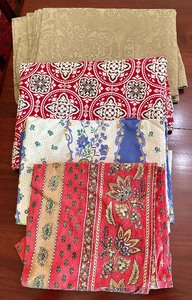 lot 187 image: Tablecloths, Runners, Tablecloth Holders and an Apron