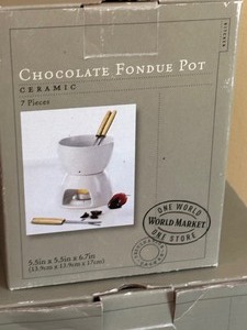 lot 164 image: Williams and Sonoma Cast Iron Fondue Pot and Chocolate Fondue Pot