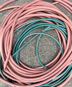 lot 263 image: Two Garden Hoses