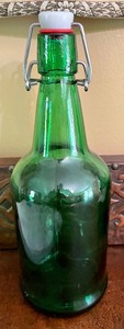 lot 276 image: 7 Green Glass Bottles