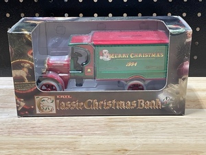lot 14 image: ERTL Classic Christmas Bank 1994 Die Cast Model
