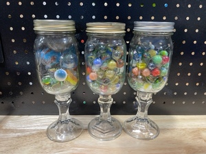 lot 52 image: Glass Jars of Marbles