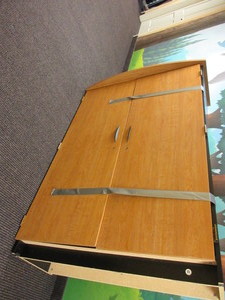 lot 821 image: DESK IN A VENEER CABINET