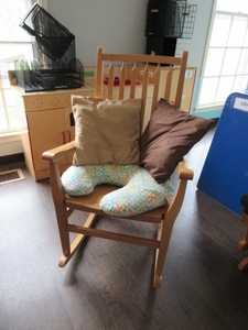 lot 854 image: WOODEN  ROCKER, BOPPY CUSHION AND PILLOWS