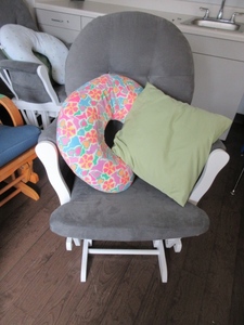 lot 856 image: WHITE FRAME GLIDE ROCKER WITH PILLOWS