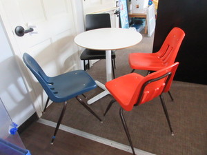 lot 861 image: ROUND TABLE AND COLORFUL CHAIRS