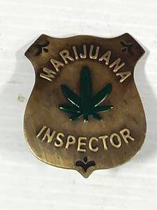 lot 41 image: Brass Marijuana Inspector Badge