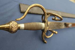 lot 16 image: SWORD WITH LEATHER SHEATH